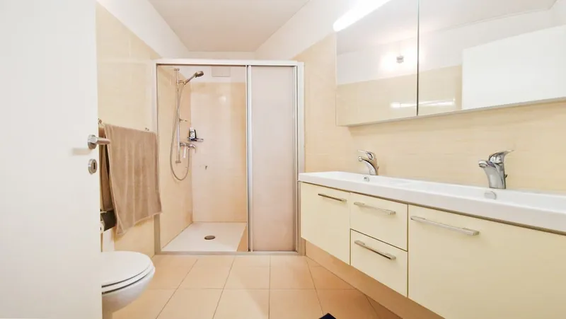 Elegante ampio 3,5 con balcone coperto e posteggio in autorimessa, foto 7