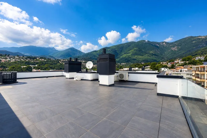Elegante attico 4,5 con roof top privato e piacevole vista aperta, foto 2
