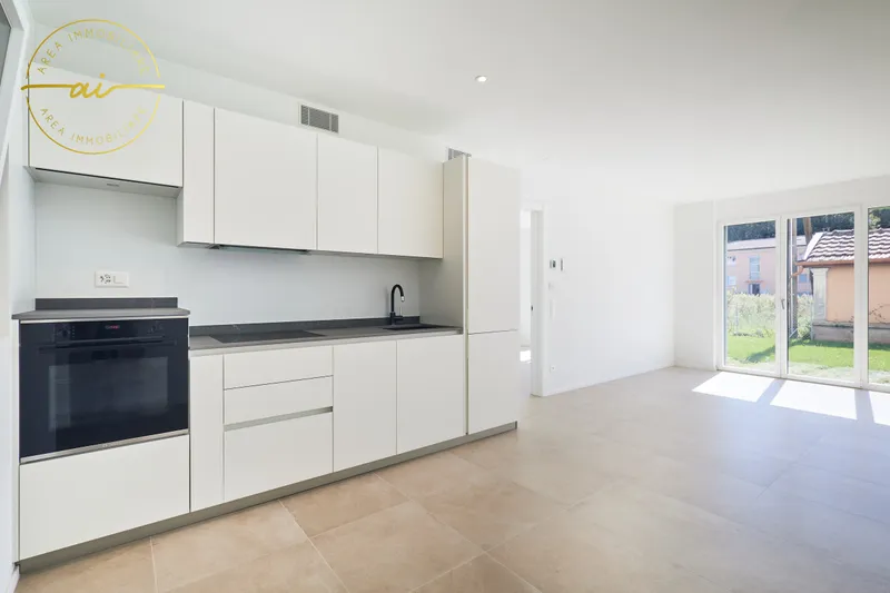 ELEGANTE 2.5 LOCALI DI NUOVA COSTRUZIONE CON GIARDINO, foto 2