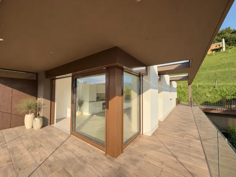 NUOVO ATTICO 2.5 LOCALI CON TERRAZZA VISTA LAGO A ROVIO, foto 3