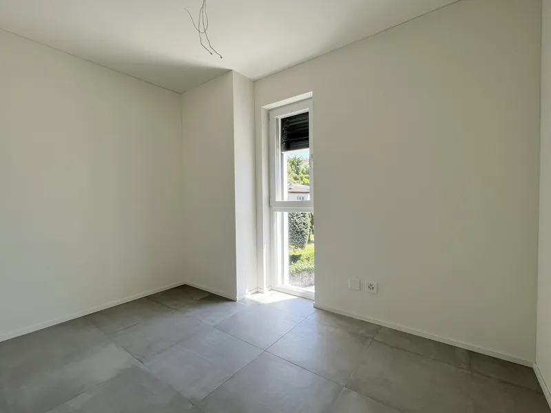 AFFITTASI NUOVO 4.5 LOCALI CON TERRAZZA A MORBIO INFERIORE, photo 4