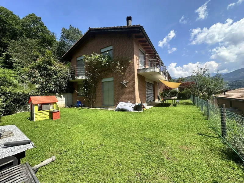 CASA UNIFAMILIARE 5.5 CON GIARDINO NEL VERDE A CANOBBIO, foto 1