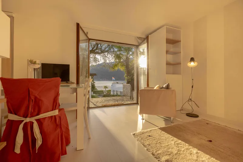 AFFITTASI 1.5 CON GIARDINO E PISCINA VISTA LAGO A MORCOTE, foto 3