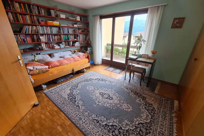 CASA UNIFAMILIARE ATTIGUA 4.5 LOCALI CON GIARDINO AD AGNO, foto 6