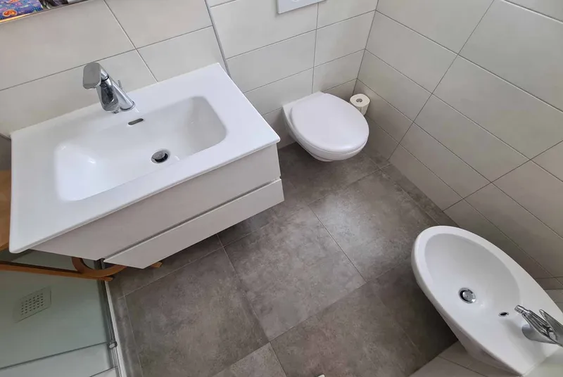 AFFITTASI AMPIO ATTICO 3.5 LOCALI CON TERRAZZA A MASSAGNO, foto 9