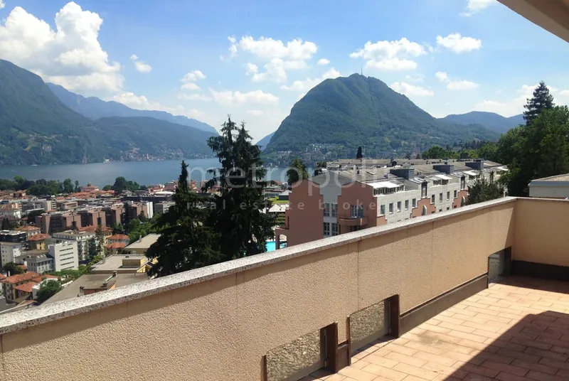 OCCASIONE UNICA - ATTICO 4.5 CON VISTA LAGO APERTA A LUGANO, photo 3