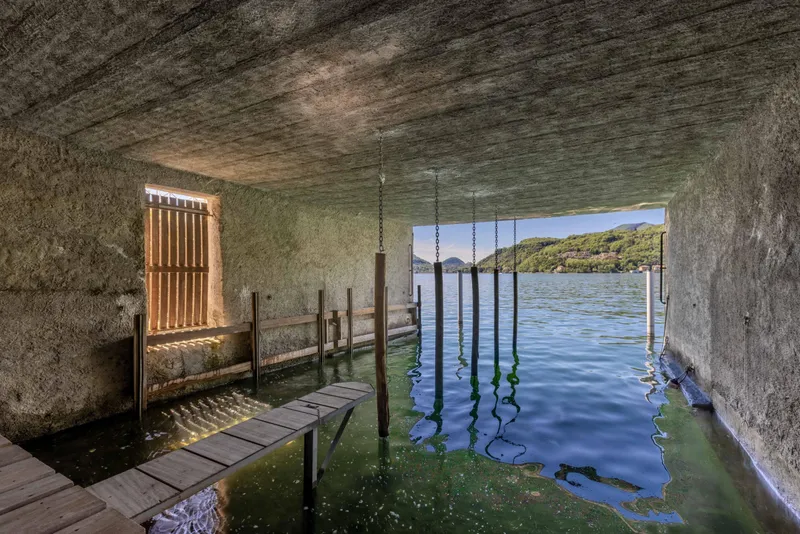 AMPIO ATTICO 2.5 VISTA LAGO CON PISCINA E DARSENA A MORCOTE, photo 9