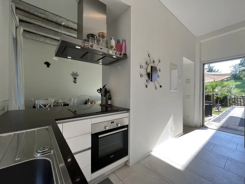 AFFITTASI MODERNO DUPLEX 2.5 LOCALI CON GIARDINO A COLDRERIO, photo 2