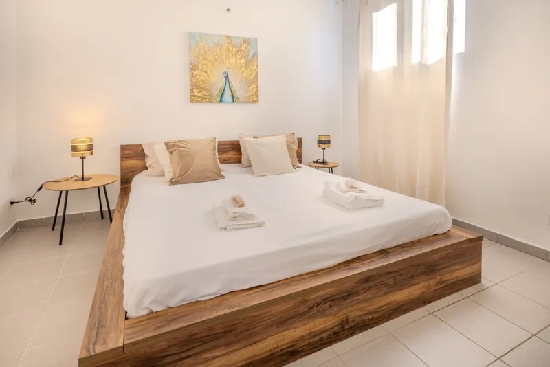 AMPIO 2.5 LOCALI CON POSTO AUTO E GIARDINO A LUGANO-DINO, foto 1