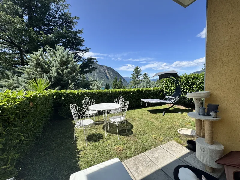AFFITTASI 2.5 VISTA LAGO CON GIARDINO E PISCINA A BISSONE, foto 2