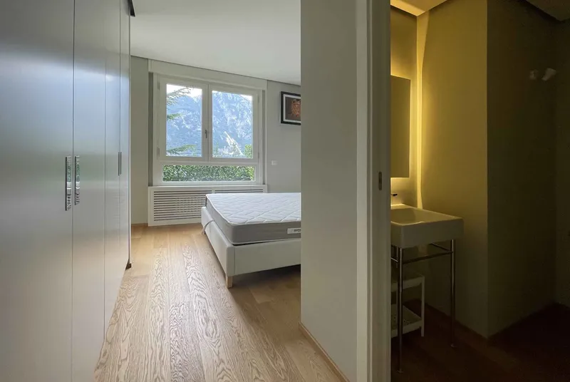 AFFITTASI 2.5 VISTA LAGO CON GIARDINO E PISCINA A BISSONE, foto 7