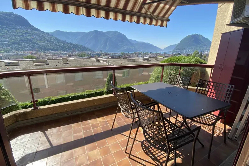 2.5 LOCALI CON VISTA LAGO E PISCINA RESIDENZIALE A LUGANO, foto 1