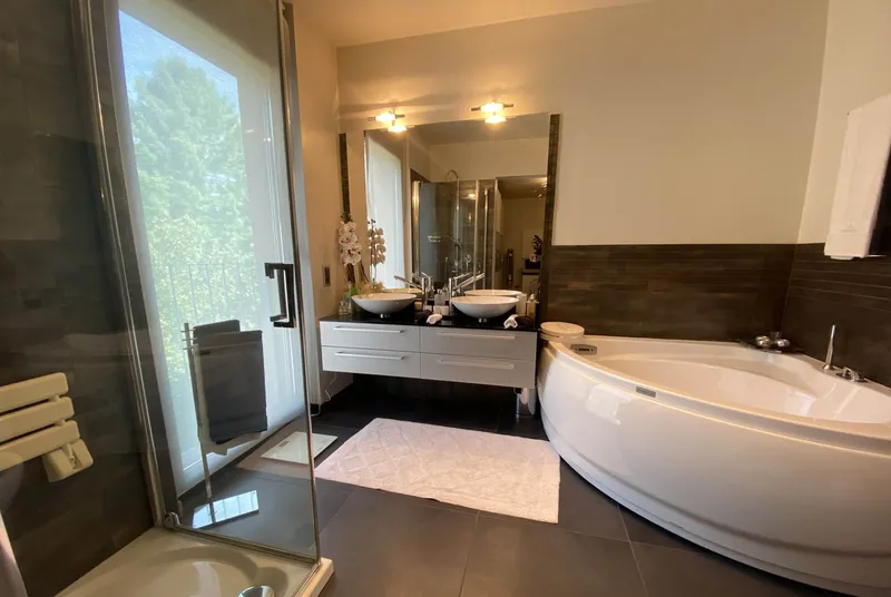 PRESTIGIOSO ATTICO 6.5 CON ROOF GARDEN AD AGNO, Foto 13